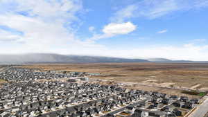 Aerial view of residential area featuring mountains