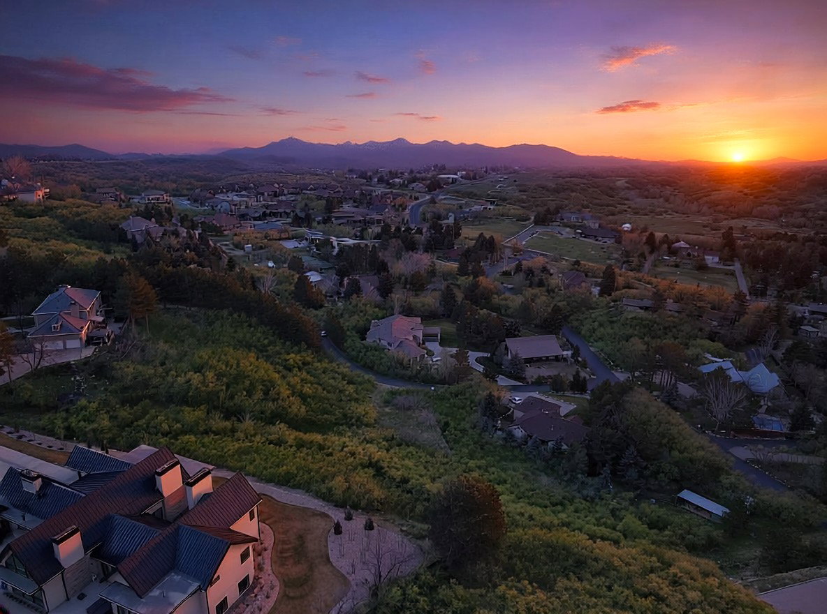 Aerial view of residential area with a mountain backdrop