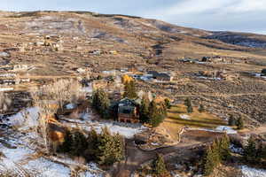 View of mountain background featuring nearby suburban area