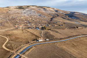 View of mountain backdrop featuring rural landscape and a desert landscape