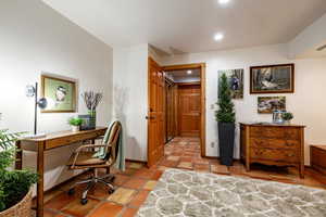 Home office featuring recessed lighting and light tile patterned flooring