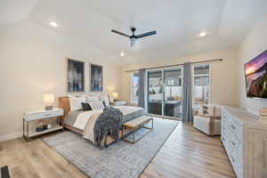 Bedroom featuring access to exterior, light wood-style flooring, recessed lighting, and a ceiling fan