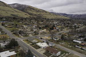 Aerial perspective of suburban area featuring mountains