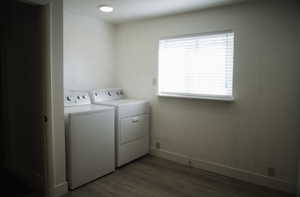 Laundry area with LVP flooring and washer/dryer