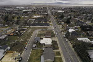 Aerial view of property's location featuring nearby suburban area