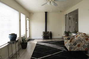 Living area featuring abundant light and Napolean gas fireplace.
