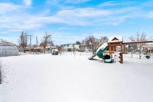 Play gym with rubber three slide and mulch