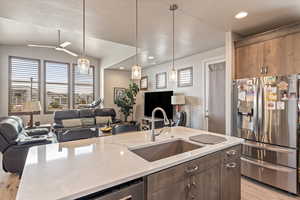 Kitchen to Living Room. Lots of nice cabinets and counter top space!