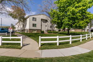 Surrounding community featuring a fenced front yard
