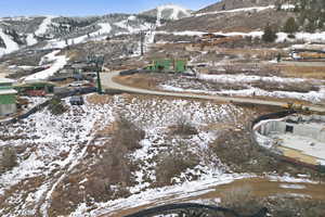 Snowy aerial view with a mountain view
