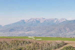 View of mountain backdrop featuring a golf club