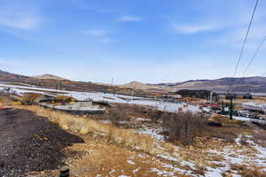 View of yard with a mountain view