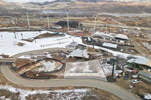 Snowy aerial view with a mountain view