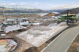 Snowy aerial view with a mountain view