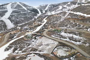 Snowy aerial view with a mountain view