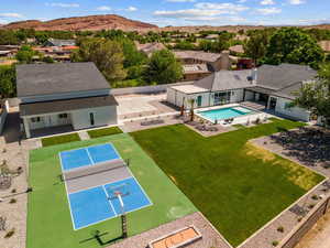 Drone / aerial view of a pool area and mountains
