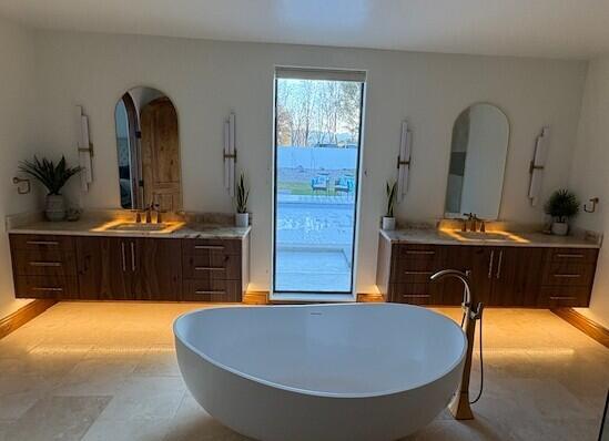 Walnut Cabinets featuring light countertops, modern cabinets, and dark wood finish cabinetry