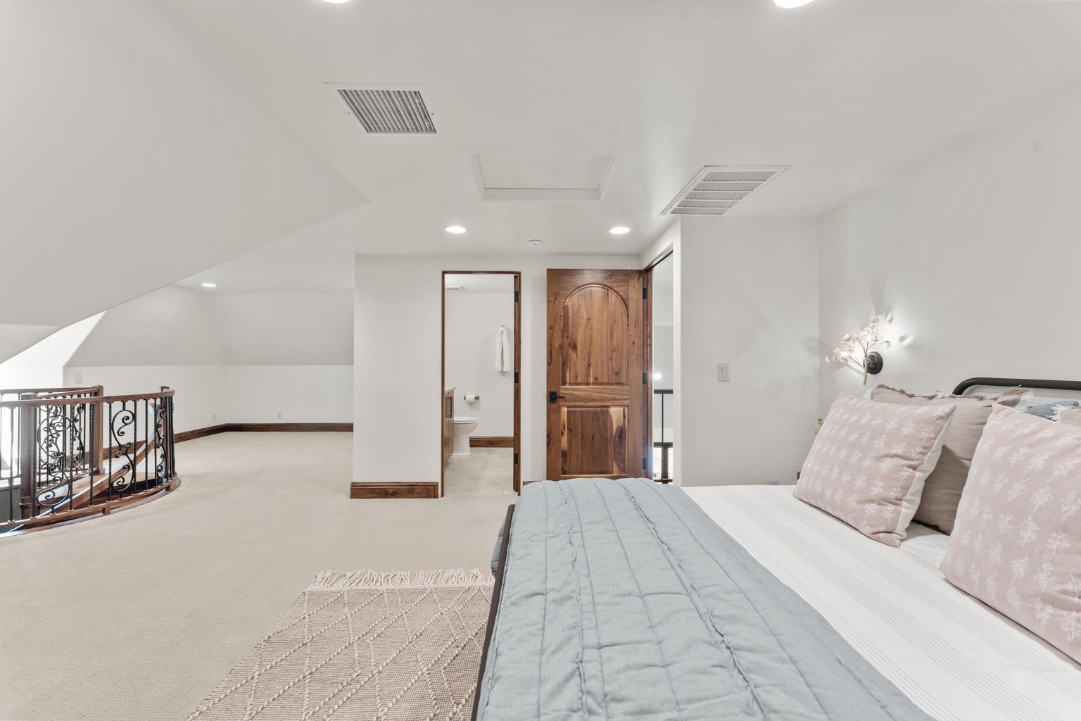 2nd Level Bedroom featuring recessed lighting, light carpet, and ensuite bathroom