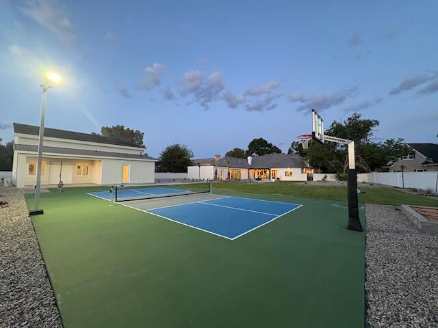 View of pickleball court with a patio area