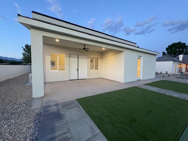 View of side RV Garage with door to the Bathroom and a side patio