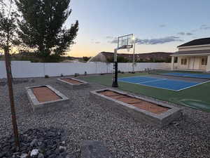View of basketball court with garden area.