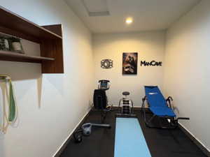 Exercise area with recessed lighting and rubber floors