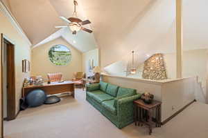 Office area featuring a ceiling fan, carpet flooring, recessed lighting, and vaulted ceiling