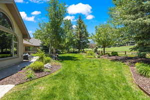 Fenced backyard featuring a patio area