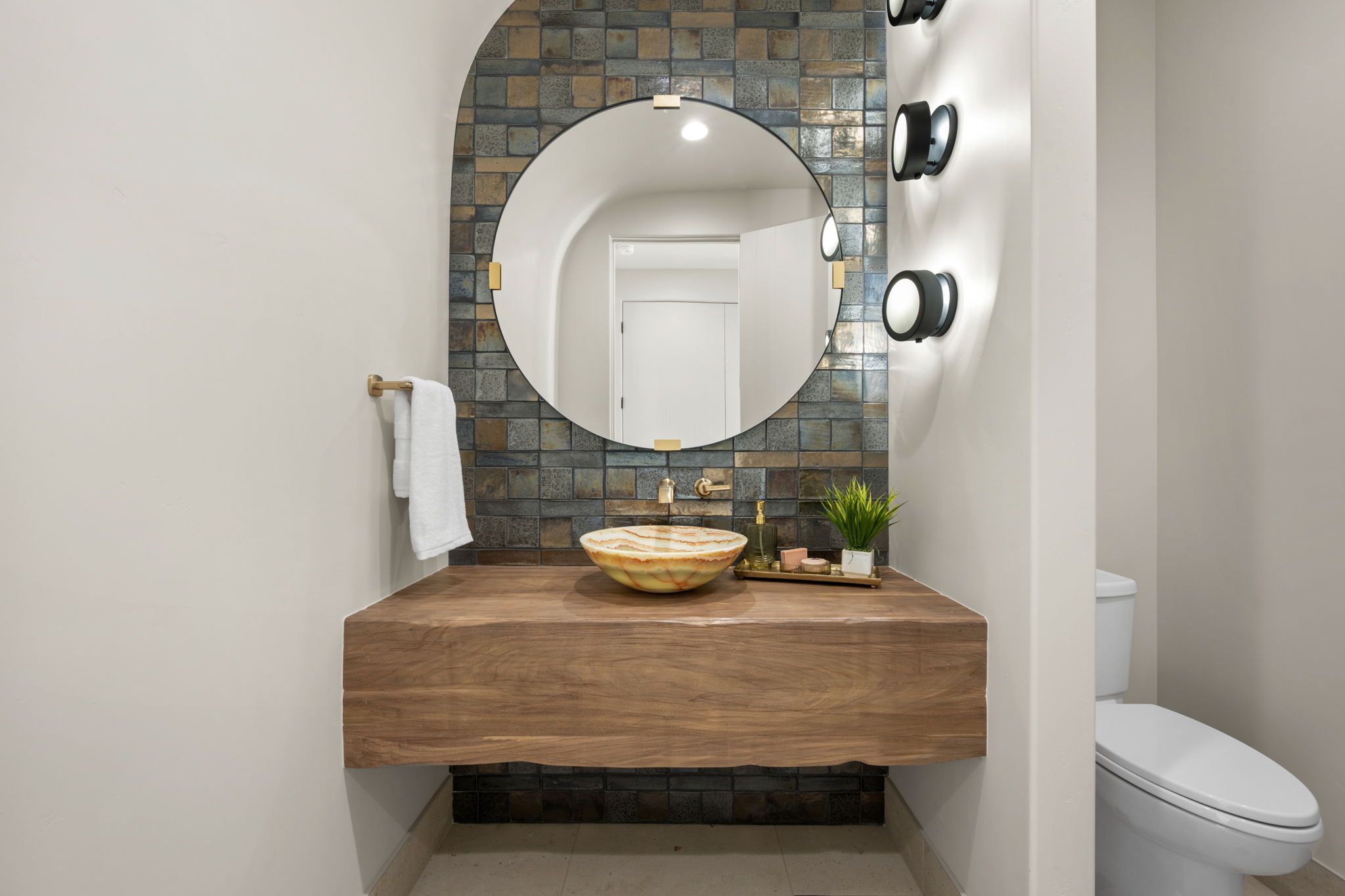 Bathroom with vanity, tile patterned floors, and decorative backsplash