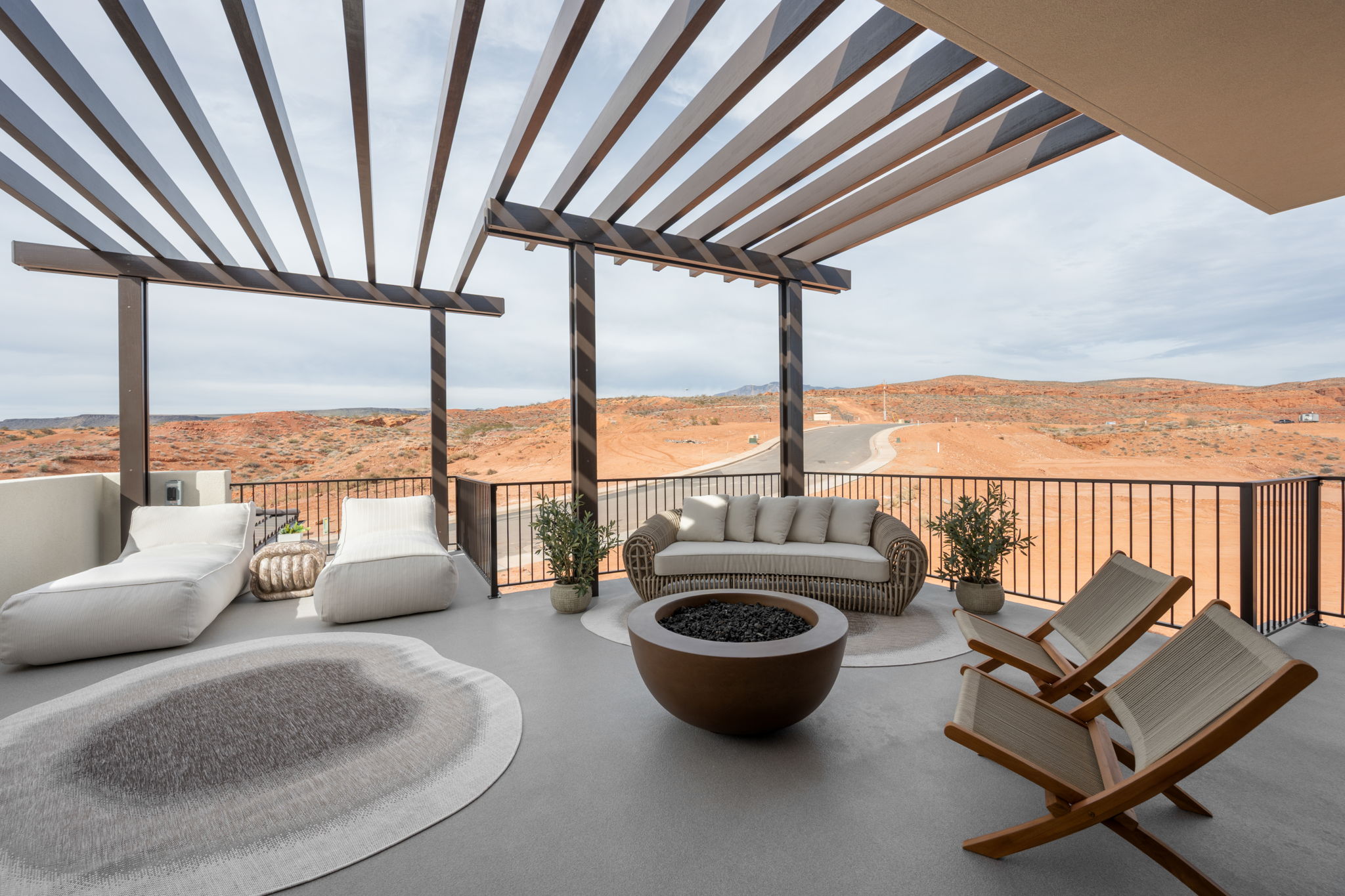 View of patio / terrace with a mountain view and an outdoor living space with a fire pit