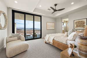 Bedroom with access to outside, expansive windows, ceiling fan, carpet floors, and recessed lighting