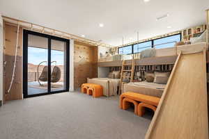 Carpeted bedroom with access to outside and recessed lighting