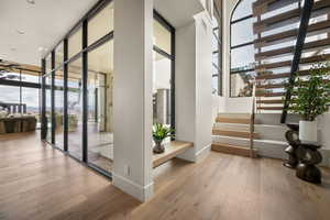 Community lobby featuring expansive windows and stairway