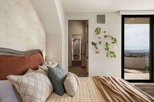 Bedroom with access to exterior and ensuite bath