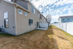 Back of house featuring a patio and a fenced backyard