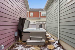 View of patio / terrace with a hot tub