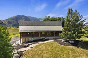 Exterior space with a mountain view and a view of rural / pastoral area
