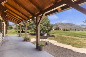 View of patio with a mountain view