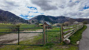View of mountain background featuring rural landscape