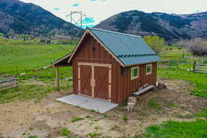 View of shed with a view of countryside and a mountain view