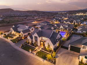 Aerial view at dusk of a residential view and a mountain view