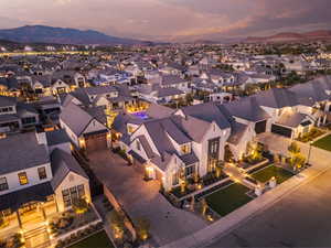 Aerial perspective of suburban area featuring a mountainous background