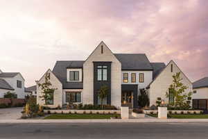 View of front of house with stone siding