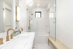 Full bathroom featuring vanity and recessed lighting