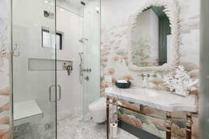 Bathroom with toilet and a shower stall