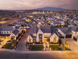 Aerial view at dusk of a residential view and a mountain view