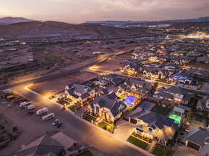 Aerial view of residential area with a mountain backdrop