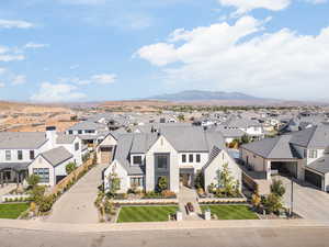 Aerial view of residential area with a mountain backdrop