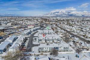 Snowy aerial view with a mountain view
