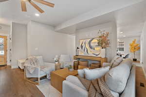 Living area featuring recessed lighting, wood finished floors, and ceiling fan
